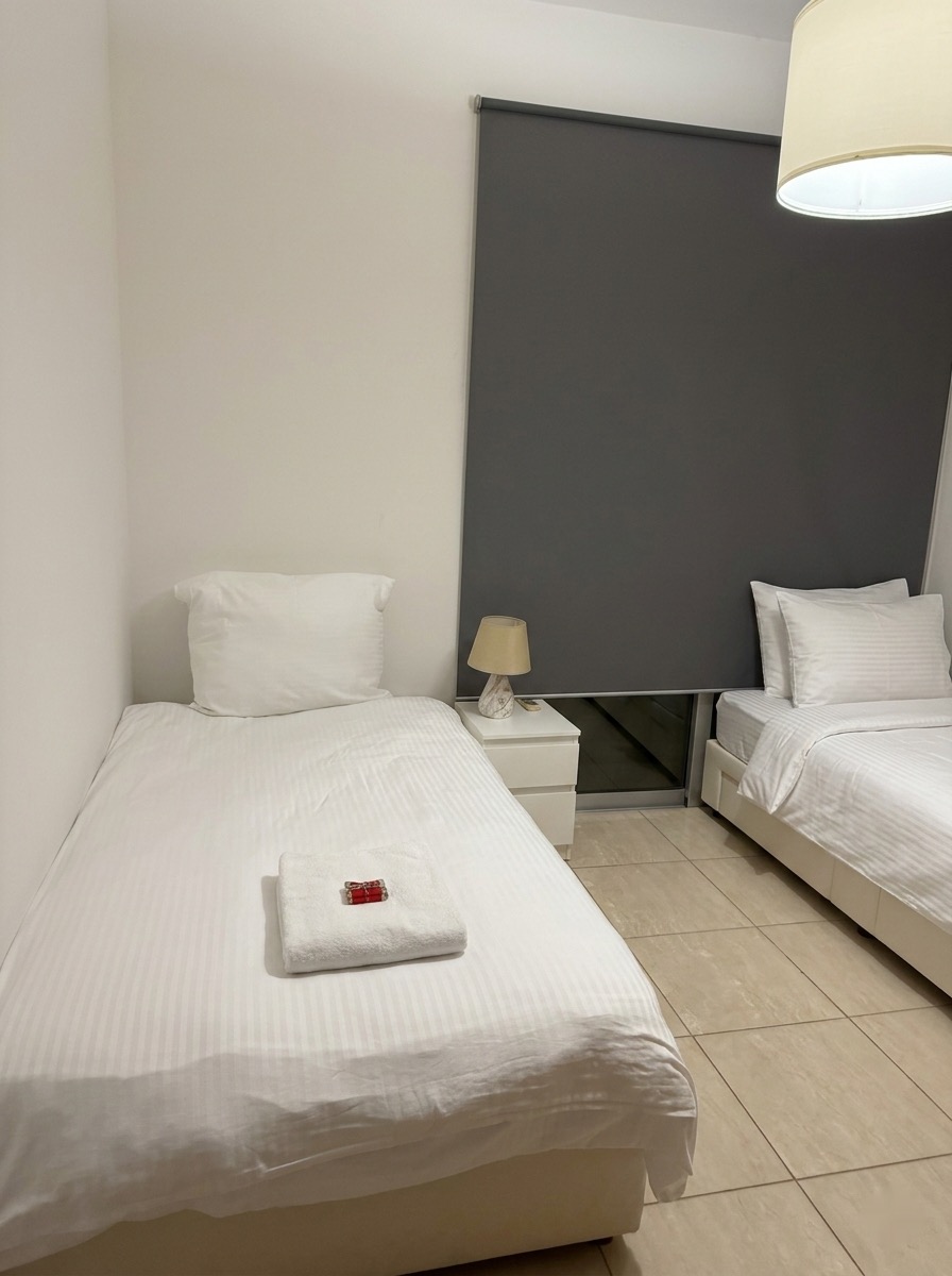 Zweites Schlafzimmer mit zwei Einzelbetten – Lux Apartment
