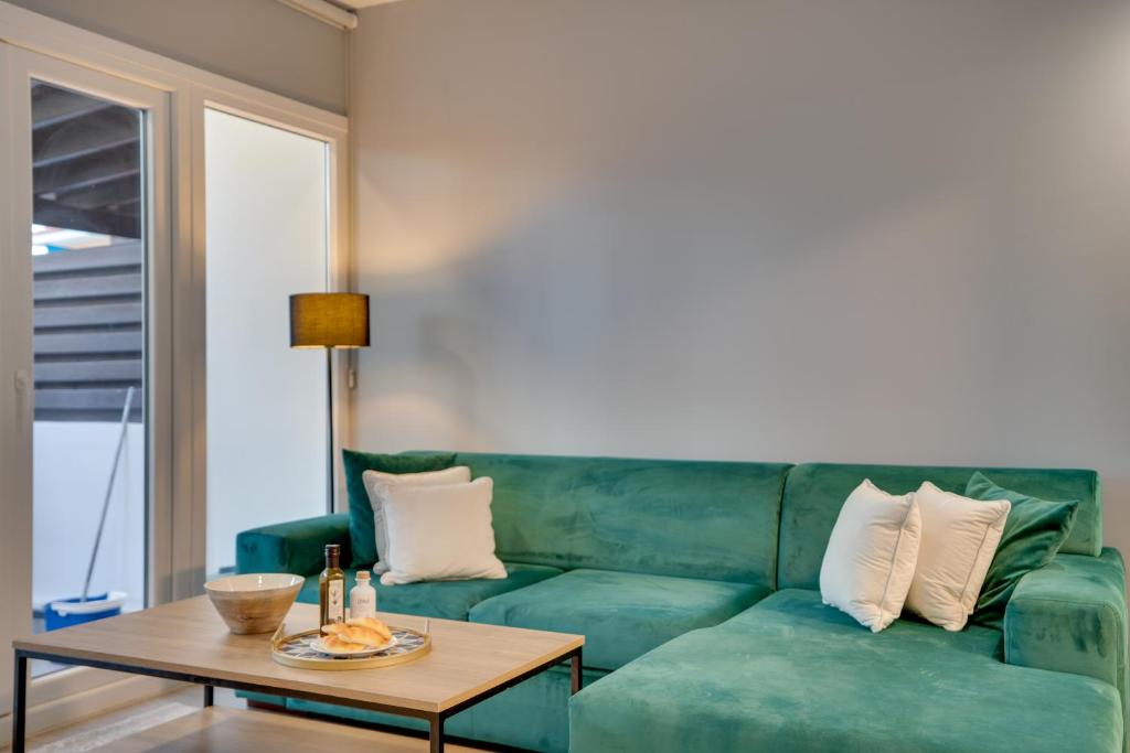 Living area and sofa at Lux Sandy Beach Suite 303